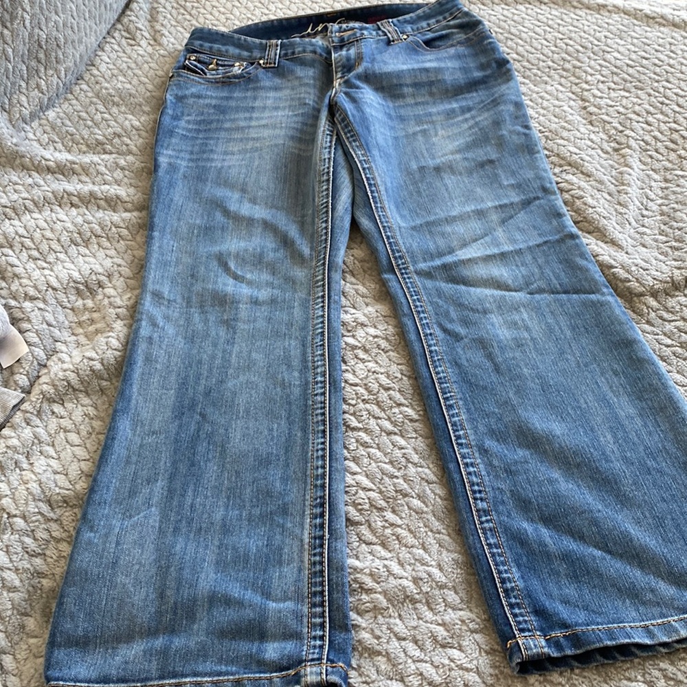 Inc denim. Curvy boot leg jeans. Studded pockets. Size 10. Gently worn.